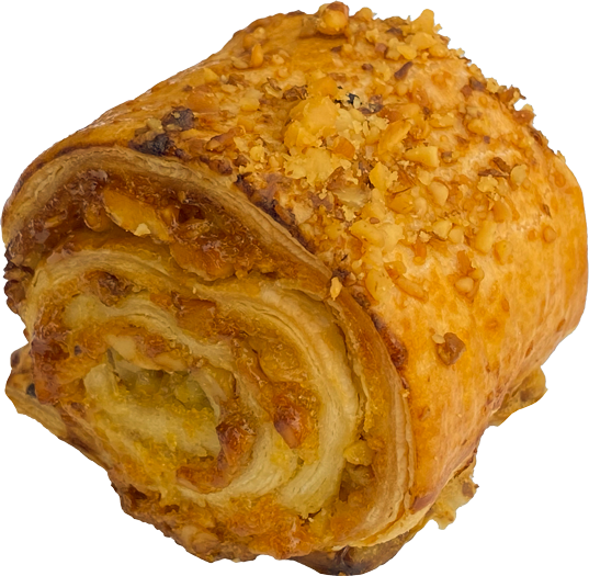 Apricot rugelach topped with chopped nuts